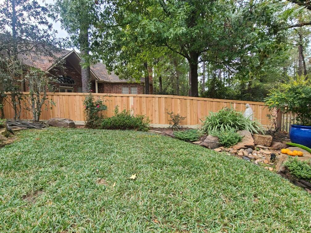 cedar board on board with cap & trim with 6in rot board